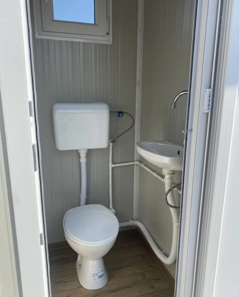 Deluxe flushing porta potty equipment reference