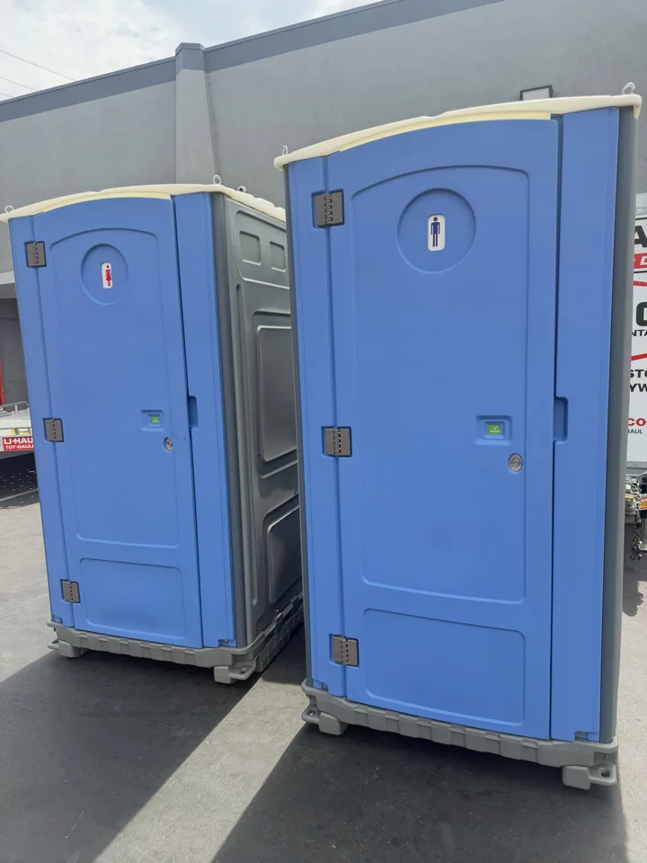 Blue portable restrooms ready for use