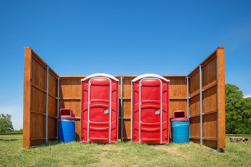Short-term porta potty units staged for delivery in Garland, Texas